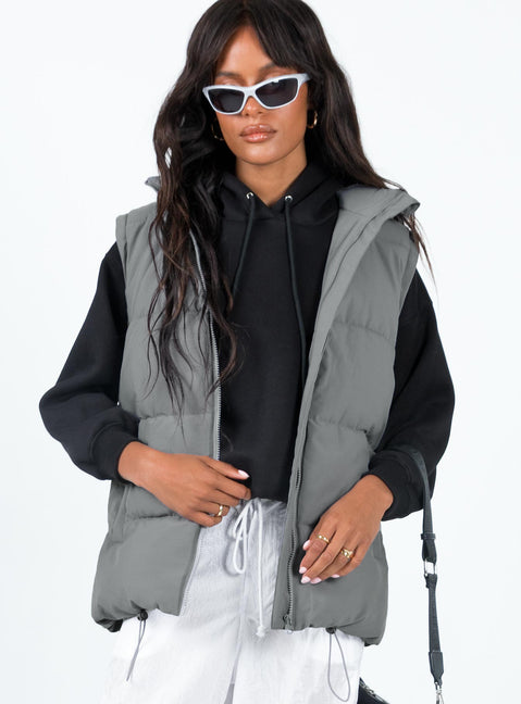 Oversized puffer vest High neck Front zip fastening Twin hip pockets Adjustable drawstring hem