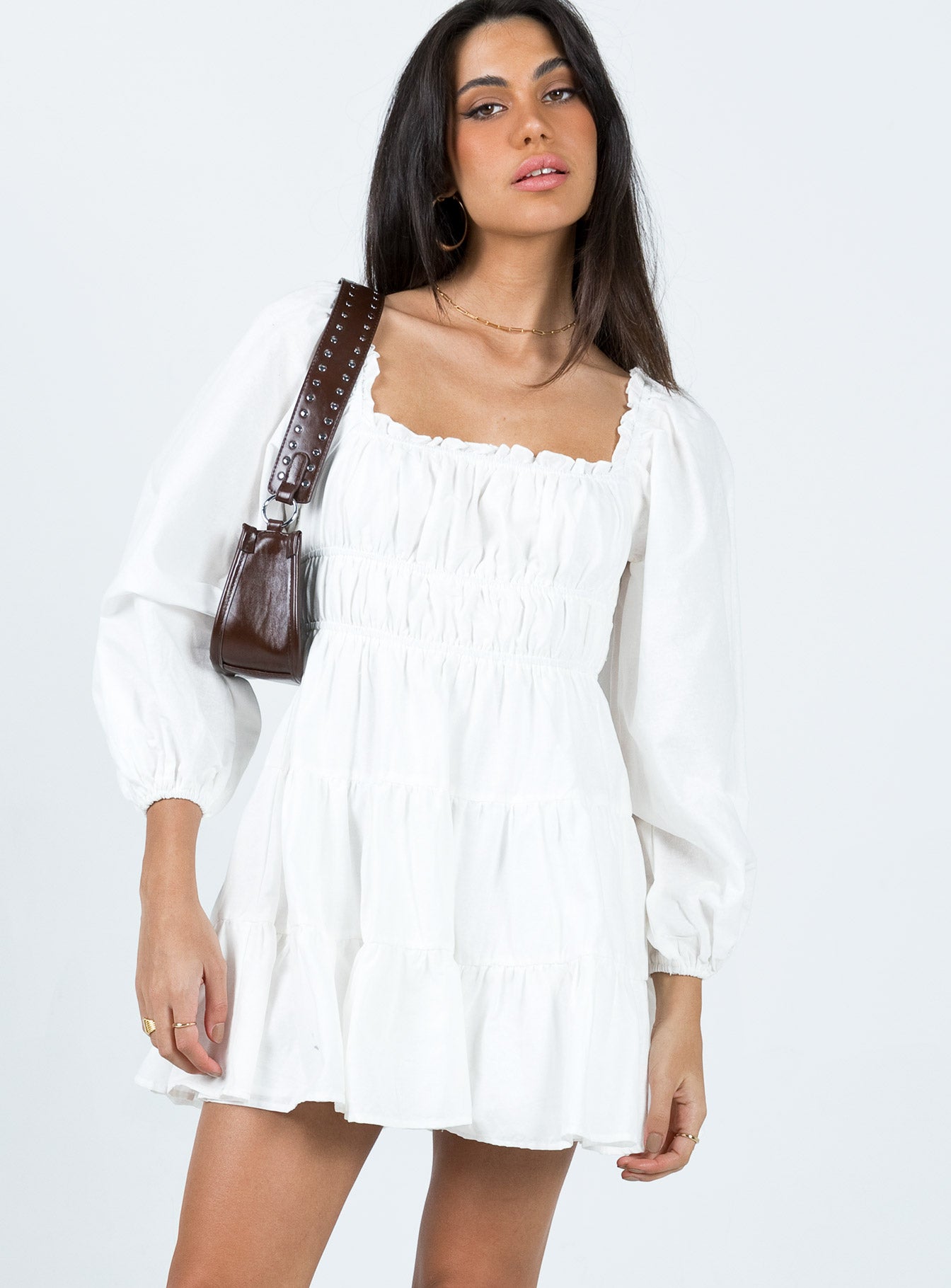 Front view of model wearing  front Princess Polly Square Neck  Ceara Long Sleeve Mini Dress White