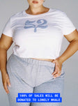 front view of model wearing Princess Polly Organic Take Care Charity Baby Tee White Curve Short Sleeve Crew Neck 