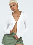 Front view of model wearing  front Princess Polly Full Sleeves Plunger  Haddock Long Sleeve Top White