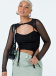 Front view of model wearing  front Princess Polly Sleeveless Square Neck  Tavouli Long Sleeve Top Black