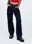 Front view of model wearing  front Princess Polly Mid Rise  Karana Slouch Jeans Indigo