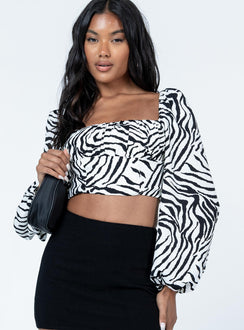 front view of model wearing Princess Polly Ariah Long Sleeve Top Zebra Full Sleeves Square Neck 