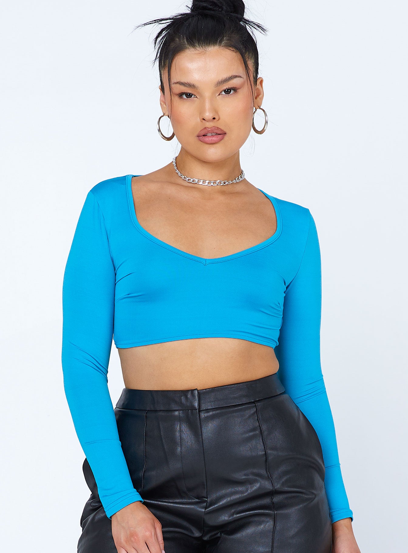 front view of model wearing Princess Polly Ryder Long Sleeve Top Blue 