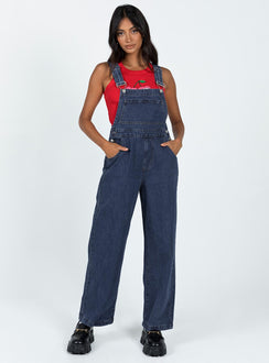 Overalls Cord material  Adjustable shoulder straps  Button fastening at hips  Chest pocket  Wide leg 