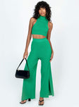 Matching set Ribbed material Tank top Mock neck Low cut sides High waisted pants Elasticated waistband Wide leg