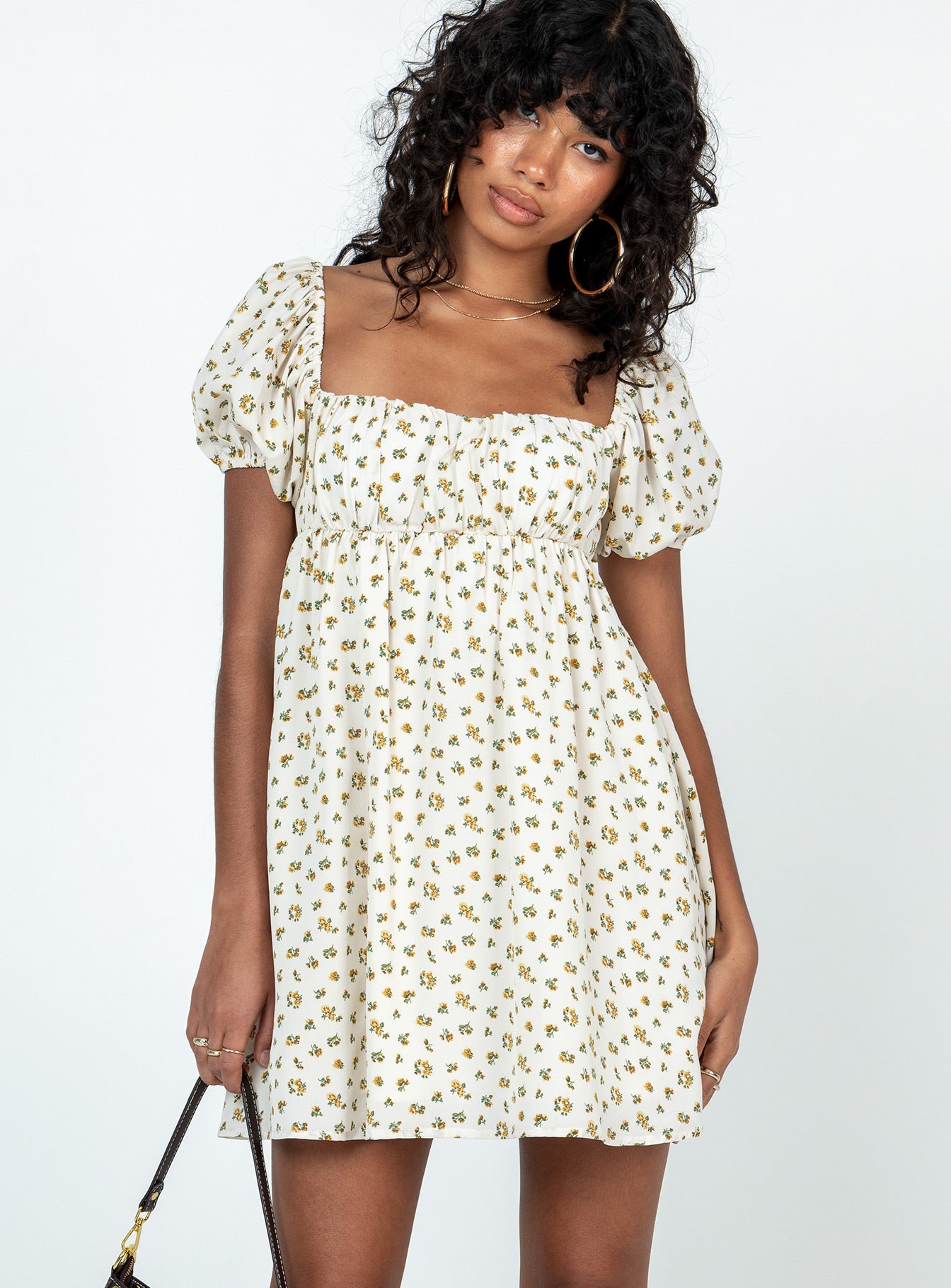 Front view of model wearing  front Princess Polly Square Neck  Let's Dance Mini Dress Yellow Floral