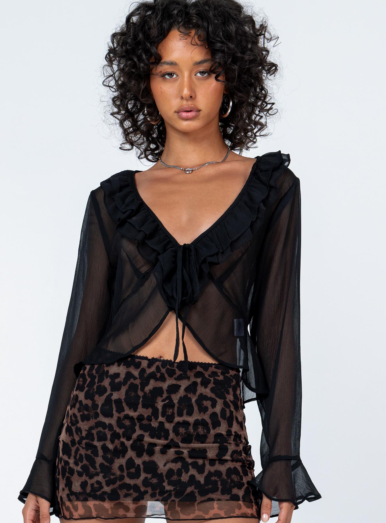 front view of model wearing Princess Polly Colby Long Sleeve Top Black Full Sleeves V-Neck 