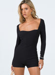 Long sleeve romper Ribbed material Square neckline Adjustable strap at back of neck Low back