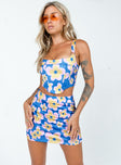   side view of model wearing Princess Polly Ilina Mid Rise Mini Skirt Floral Blue Mini Skirts 