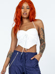 White crop top Halter neck tie fastening  Adjustable tie ruching at front  Pointed hem  Partially exposed back 