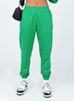 back view of model wearing Princess Polly Club Basic Trackpants Green 