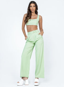 Matching set Crop top Fixed straps Invisible zip fasting at side High waisted pants Wide relaxed leg Belt loops at waist Zip & button fastening Lined top