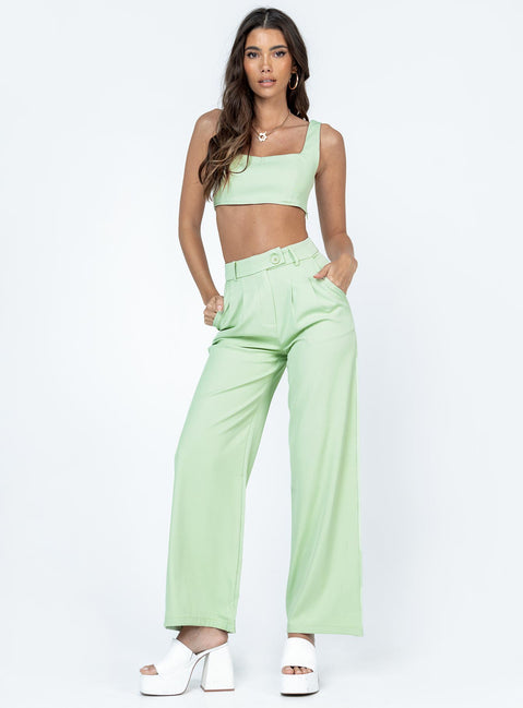 Matching set Crop top Fixed straps Invisible zip fasting at side High waisted pants Wide relaxed leg Belt loops at waist Zip & button fastening Lined top