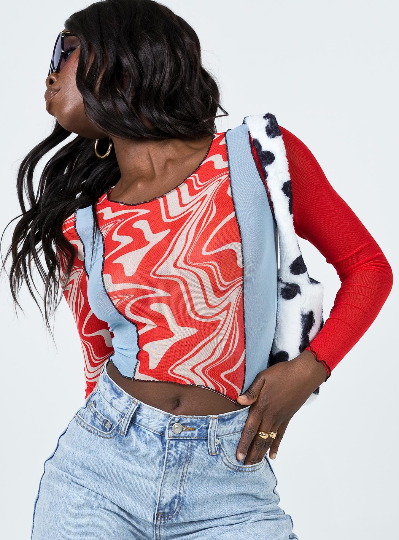 side view of model wearing Princess Polly Division Long Sleeve Top Multi 