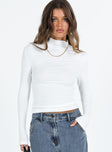 White long sleeve top Ribbed material Mock neck Good stretch Unlined