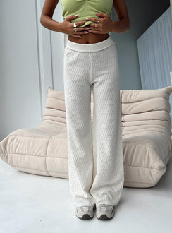 Front view of model wearing  front Princess Polly High Waisted Pants High Waisted Pants  Omari Knit Pants White