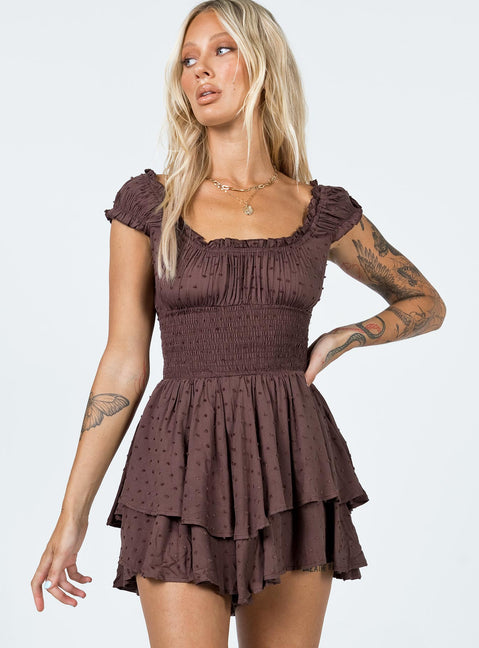 Romper Soft textured material Shirred waistband Ruffle detailing Elasticated neck and sleeves Can be worn on or off shoulder Layered ruffle hem Fully lined