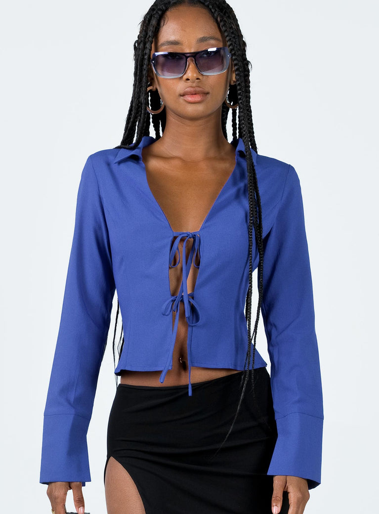 Front view of model wearing  front Princess Polly Full Sleeves Square Neck  Lida Long Sleeve Top Blue