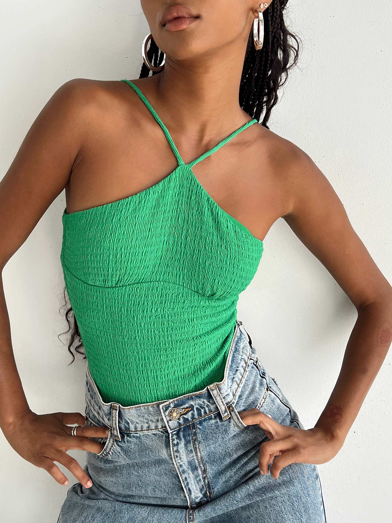 front view of model wearing Princess Polly Niles Bodysuit Green Sleeveless Asymmetric Neckline 
