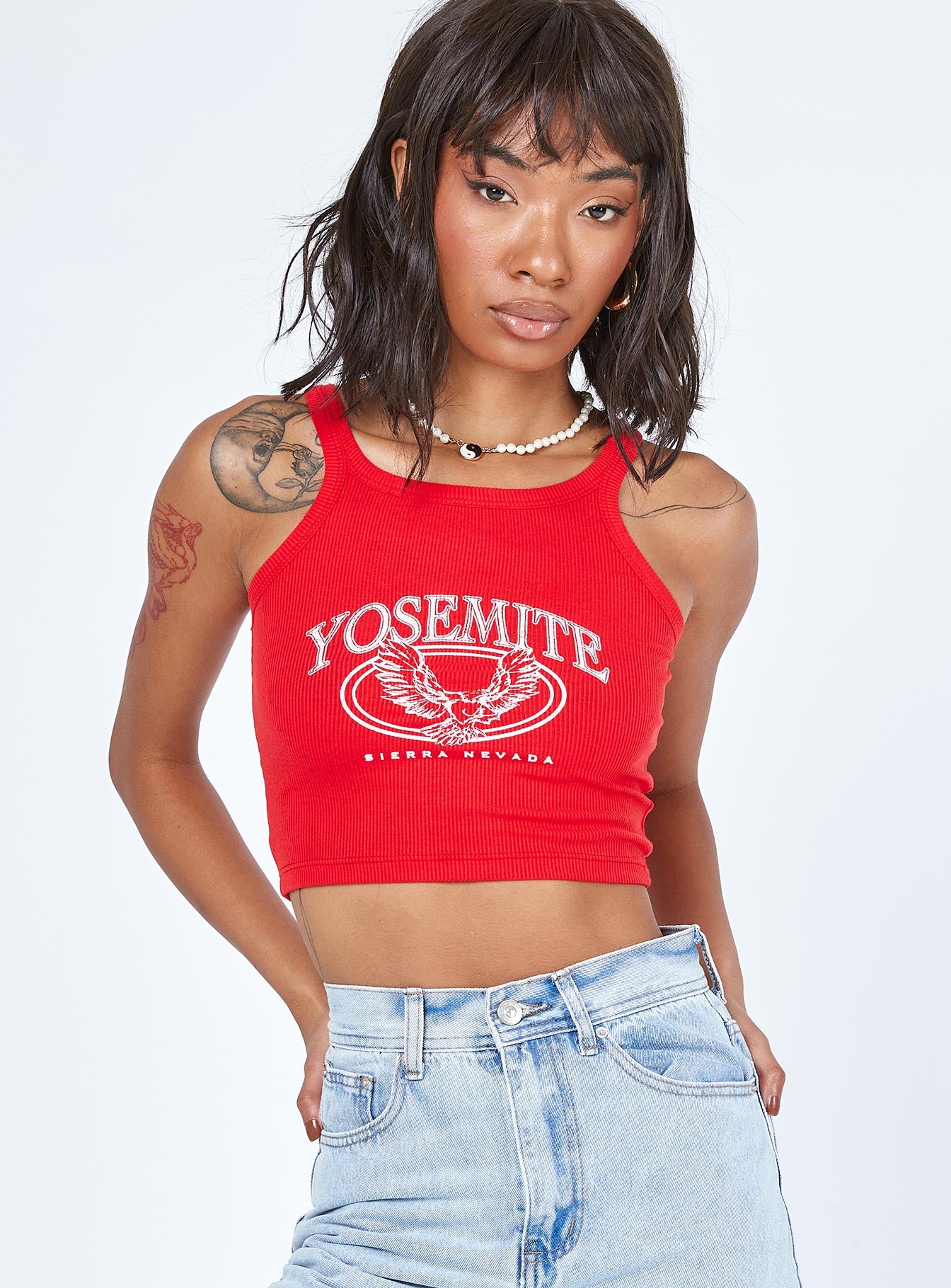 front view of model wearing Princess Polly Yosemite Tank Top Red 