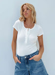 front view of model wearing Princess Polly Barcham Bodysuit White Short Sleeves Crew Neck 