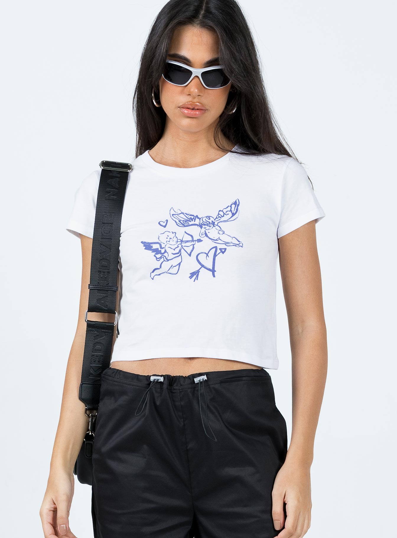 Front view of model wearing  front Princess Polly Short Sleeves Crew Neck  Organic Angels 222 Tee Ivory