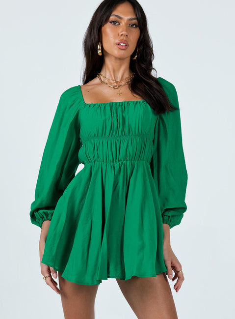 Front view of model wearing  front Princess Polly Square Neck  Halton Long Sleeve Mini Dress Green