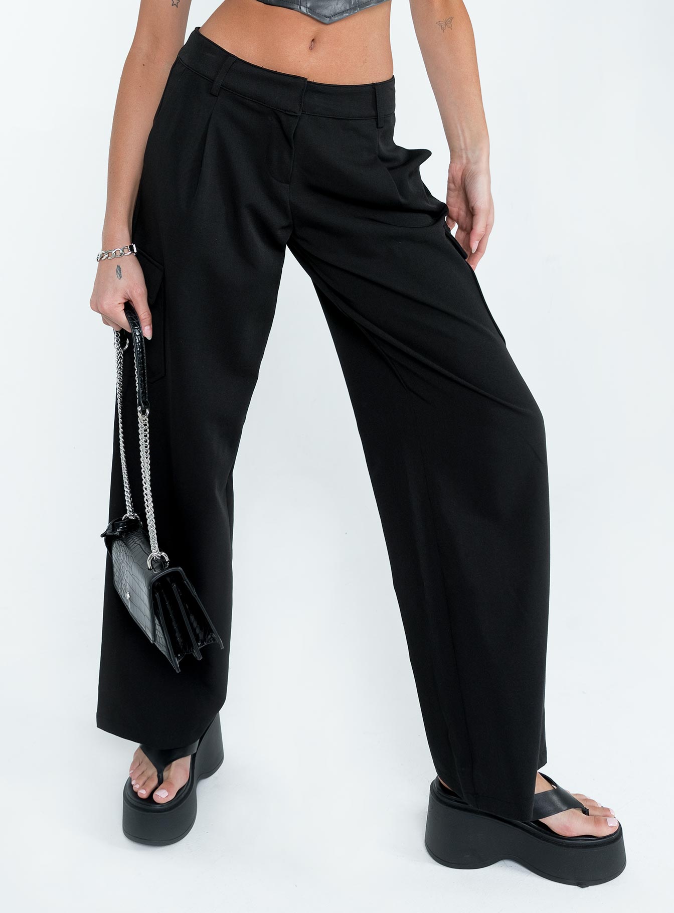 back view of model wearing Princess Polly Motel Low Rise Abba Cargo Black 