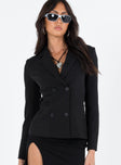 Black blazer Lapel collar  Double breasted design  Faux front pockets  Shoulder pads  Slit at back 