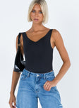 front view of model wearing Princess Polly Jarocin Bodysuit Black Sleeveless V-Neck 