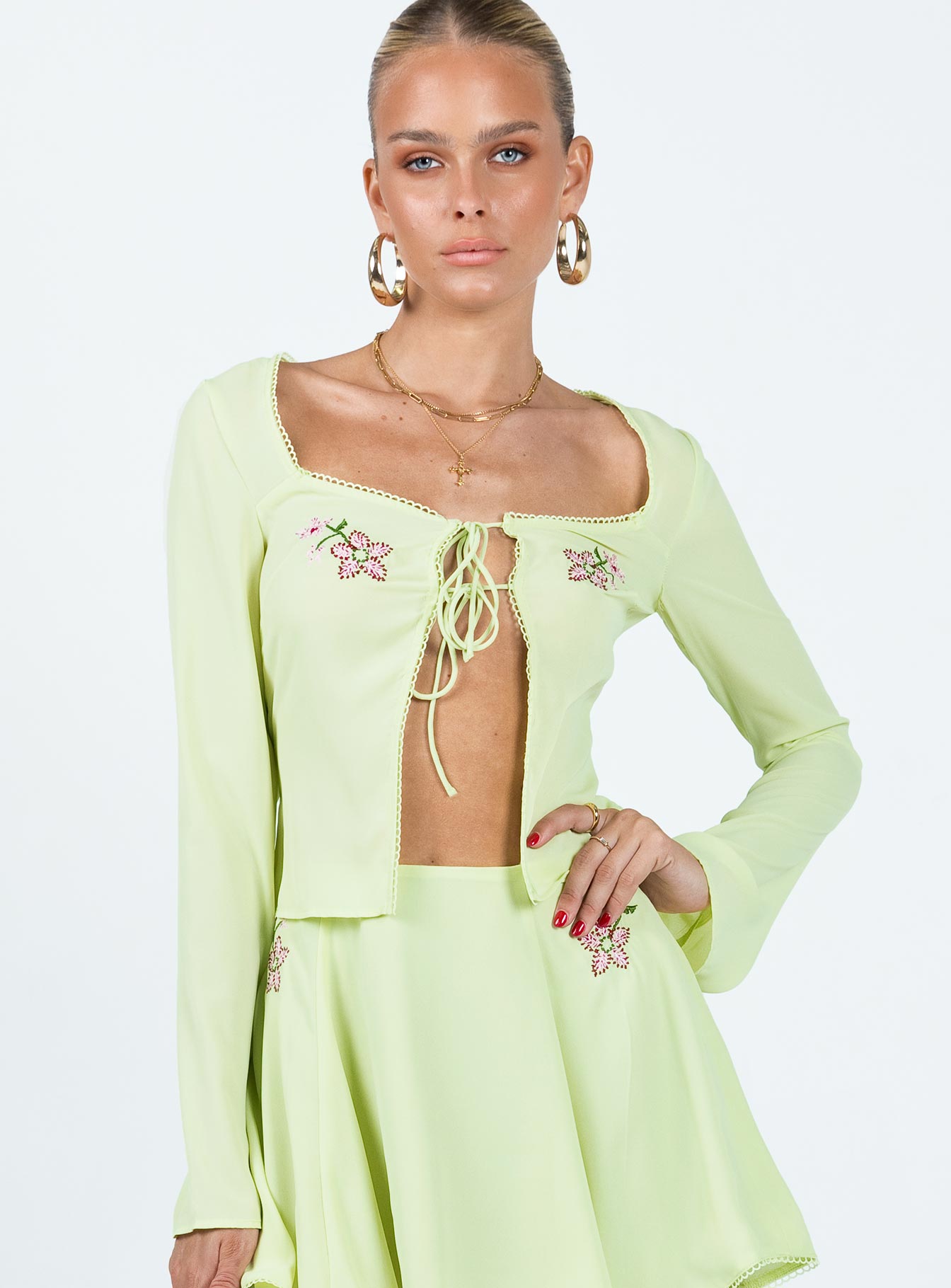 Front view of model wearing  front Princess Polly Full Sleeves Square Neck  Saleya Long Sleeve Top Green