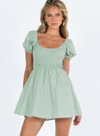 Front view of model wearing  front Princess Polly Square Neck  Everyday Sunshine Mini Dress Green