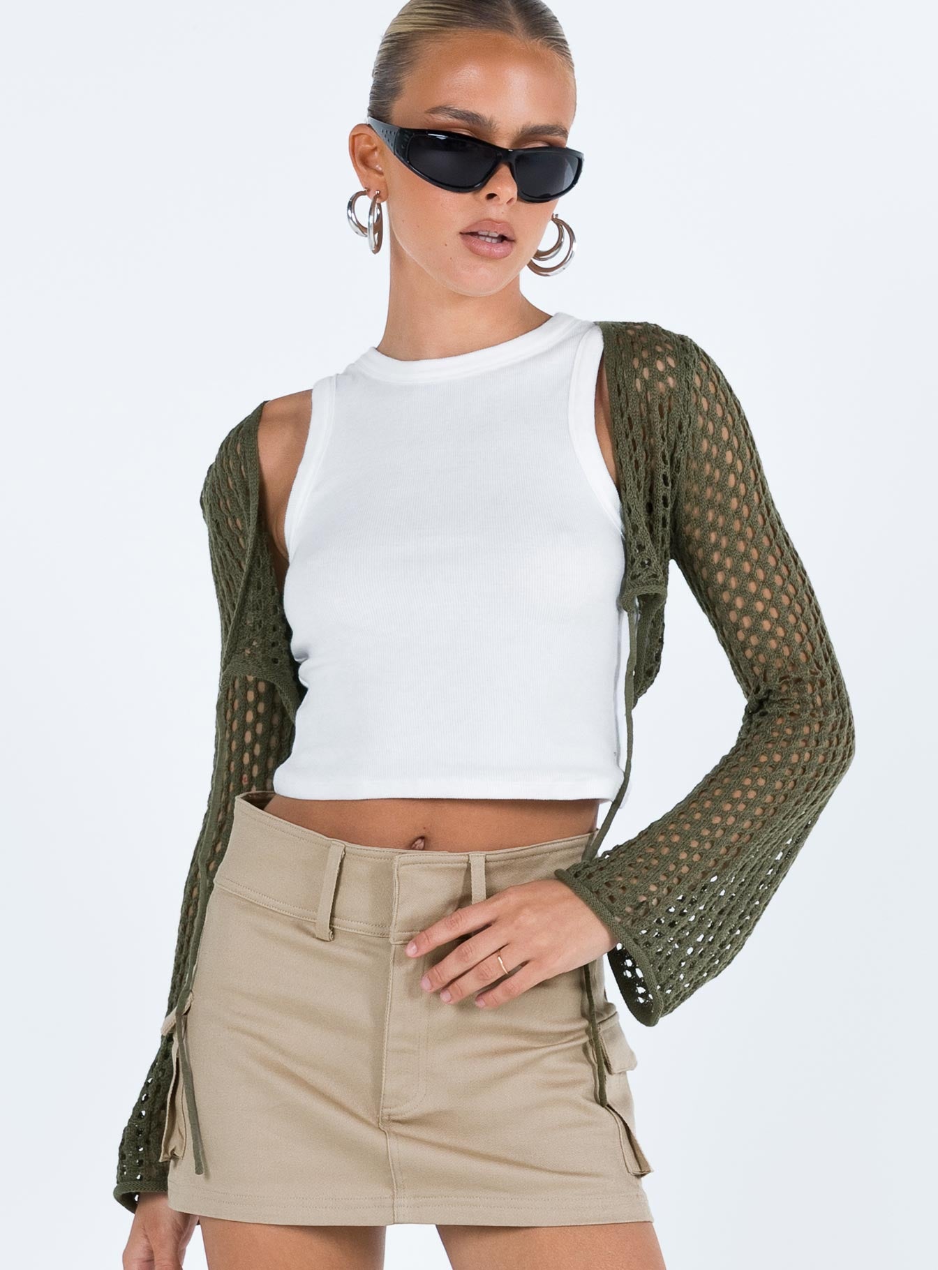 front view of model wearing Princess Polly Savi Long Sleeve Cardigan Green Cropped 