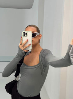 side view of model wearing Princess Polly Kentwell Bolero Bodysuit Slate Full Sleeves 