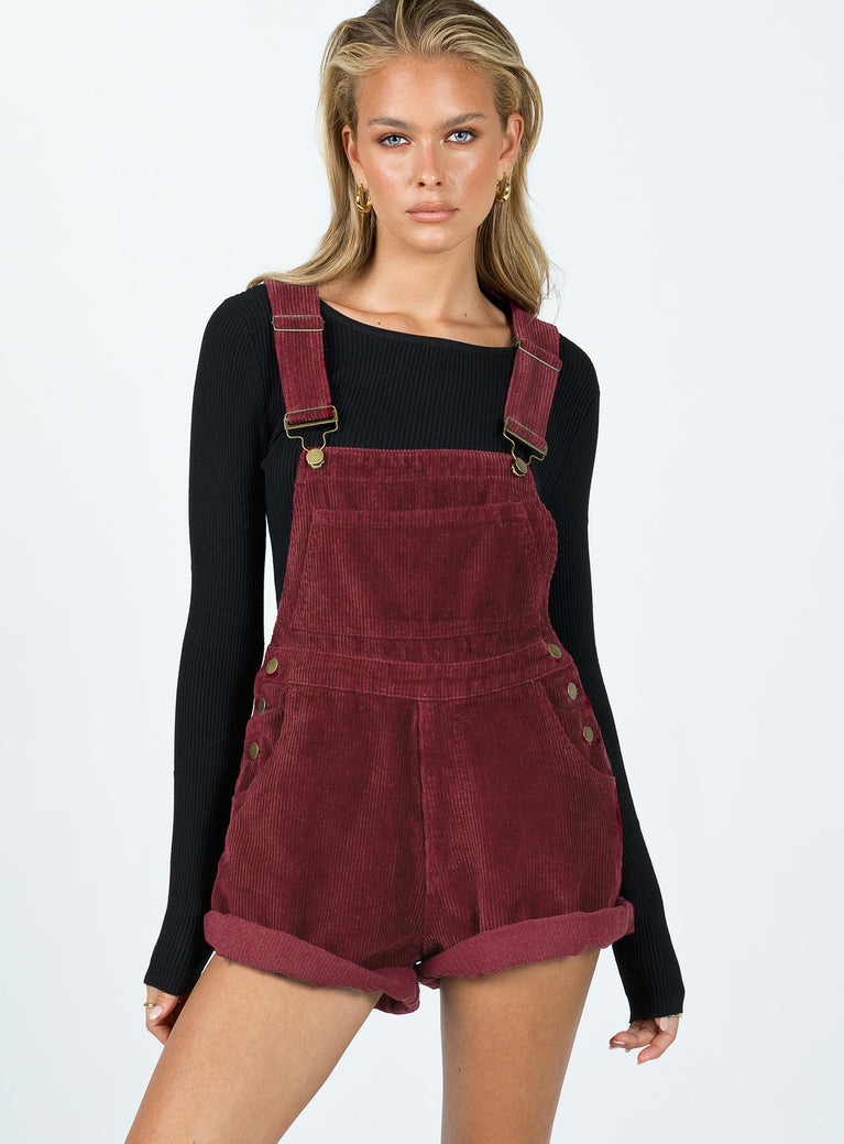 Overalls Cord material Button sides Twin hip & back pockets Large front pocket Fixed rolled hem Adjustable straps