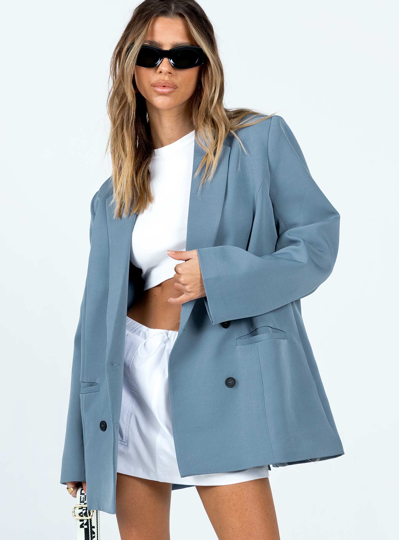 Oversized blazer in slate grey Double button fastening Twin front pockets Padded shoulders Lapel collar Split at back