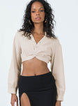 Front view of model wearing  front Princess Polly Full Sleeves Square Neck  Zaxton Long Sleeve Top Beige