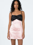 Front view of model wearing  front Princess Polly Asymmetric Neckline  Siillato Bow Mini Dress Black / Pink