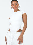 side view of model wearing Princess Polly Solita Bodysuit White Short Sleeves Boat Neck 