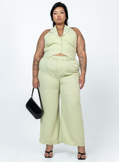 Matching set High waisted pants  Zip & button fastening  Elasticated back band  Belt looped waist  Twin hip pockets Wide leg  Vest top  Lapel collar  Button front fastening 