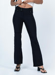 back view of model wearing Princess Polly Yianna Low Waist Flare Pant Black 