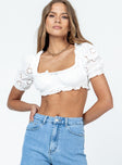 Front view of model wearing  front Princess Polly Short Sleeves Square Neck  Olympia Top White