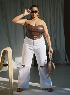 Front view of model wearing  front Princess Polly Sleeveless High Neck  Jessica PU Bustier Brown Curve