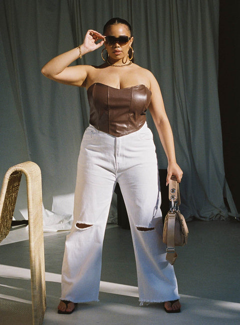 Front view of model wearing  front Princess Polly Sleeveless High Neck  Jessica PU Bustier Brown Curve