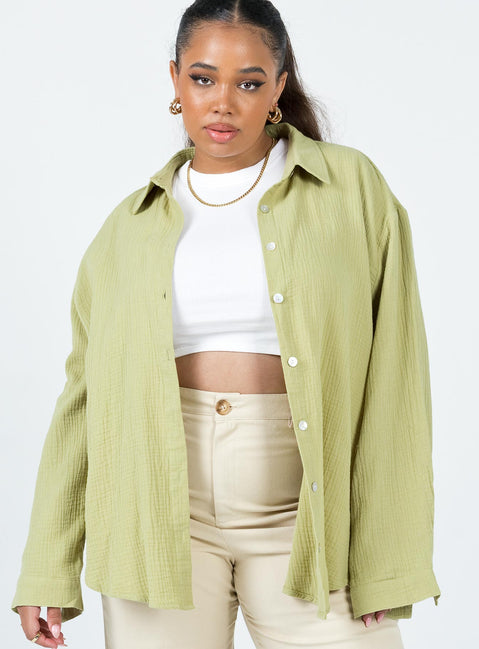 front view of model wearing Princess Polly Mahalia Shirt Green Curve 