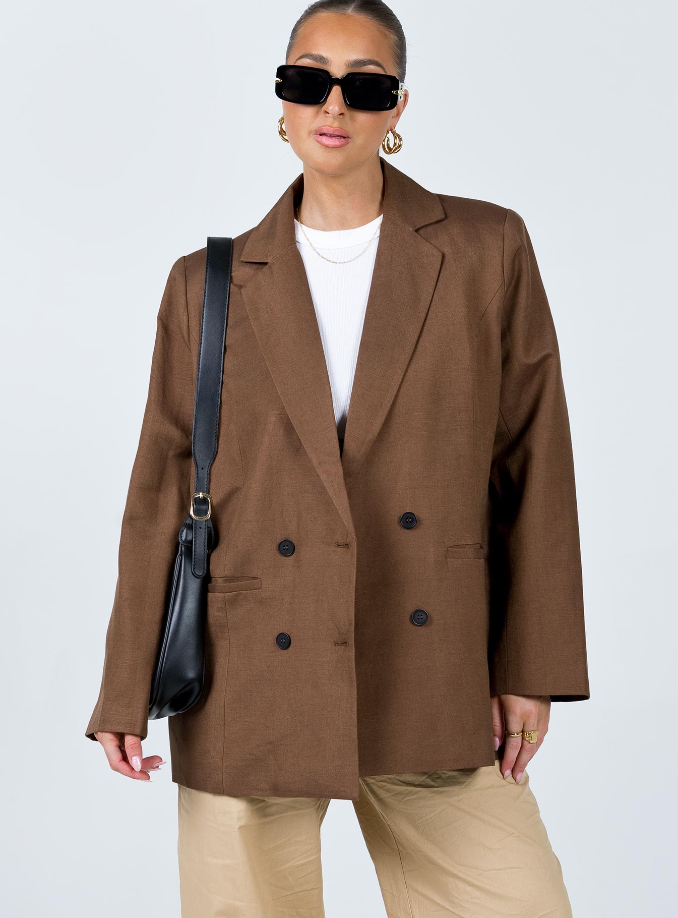 Blazer Linen material Lapel collar Button fastening at front Twin front pockets