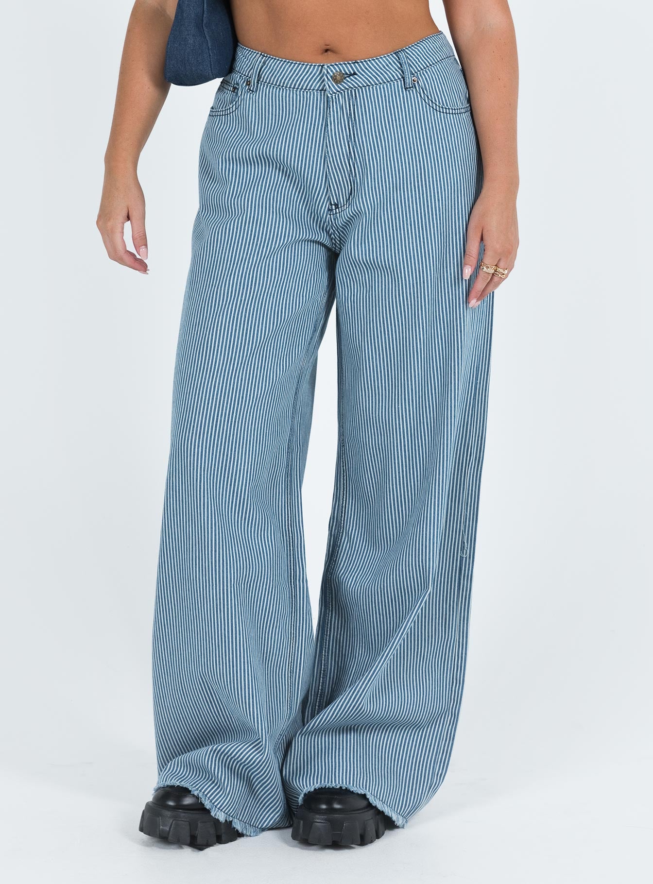 Striped blue jeans on sale