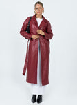 Long coat Faux leather material Lapel collar Removable waist tie Belt loops at waist Twin hip pockets Split hem at back