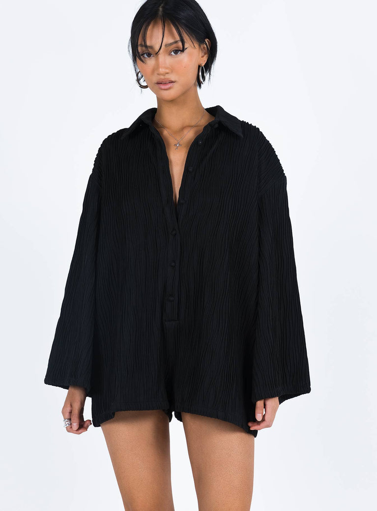 Black long sleeve romper Textured material  Button front fastening  Wide sleeves 